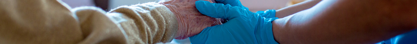 Older Lady Hand Hold With Gloves