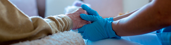 Older Lady Hand Hold With Gloves