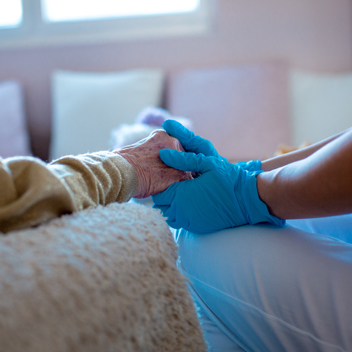 Older Lady Hand Hold With Gloves